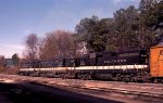 A trio of GP30's leads a train thru the yard